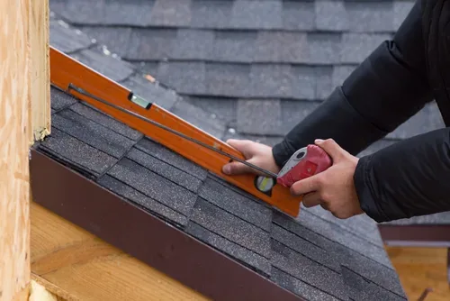 Measuring shingle courses during a roof repair